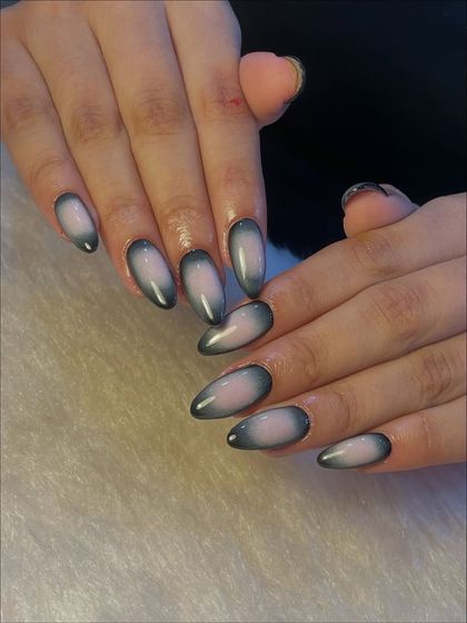 Another view of our sleek and chic ombré nails. The glossy finish and the smooth gradient effect create a look that is both modern and incredibly elegant.