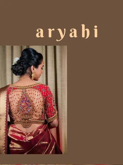 Presenting the 'Aryahi' blouse, a signature piece where traditional artistry meets sophisticated design. The elaborate back features a central embroidered motif with elegant bead chains, creating a truly unforgettable bridal statement.