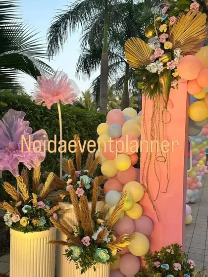 Details of our candyland theme, including custom-made giant flower props and floral arrangements that complement the sweet, pastel color scheme.