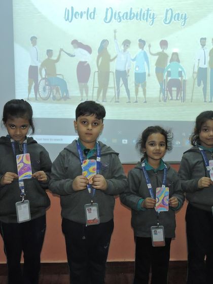 Students proudly display their artwork for World Disability Day. We use creative expression to teach important values like empathy and inclusion.