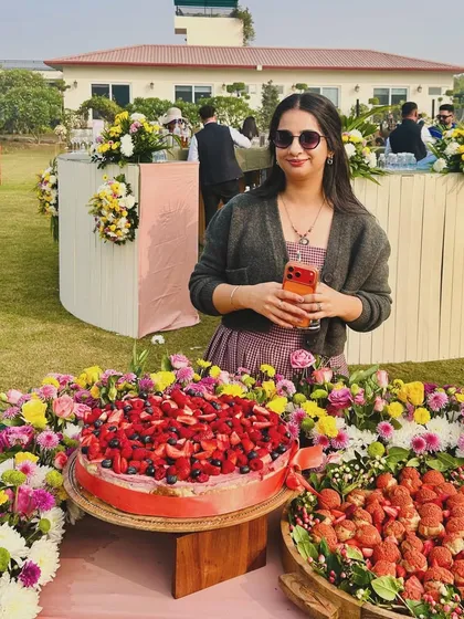 Me with two of my favorite desserts at a family event. Being able to cook for the people I love is what inspired me to start this journey in the first place.