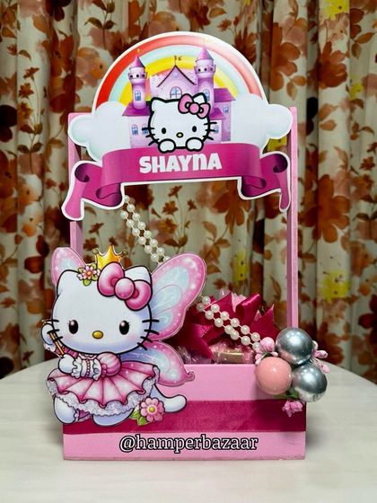 For the ultimate Hello Kitty fan! We designed this personalized hamper for Shayna, complete with a castle, rainbow, and fairy Hello Kitty.