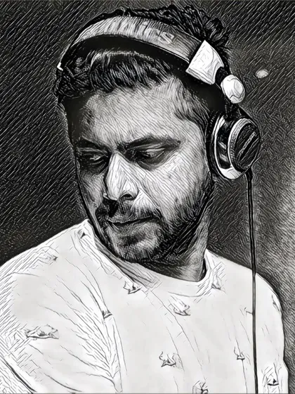 An artistic shot that captures the more introspective side of music creation. It's all about finding the right mood and tone for the track.