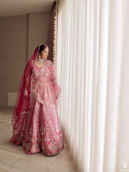 Capturing the elegance of this bride from every angle. Her look features a dewy base and soft, shimmering eyes, creating a magical and timeless effect.
