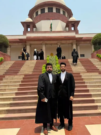 With an associate, ready for a day of hearings. I instill in my team the belief that being an advocate is a public trust, a duty we uphold with every case.