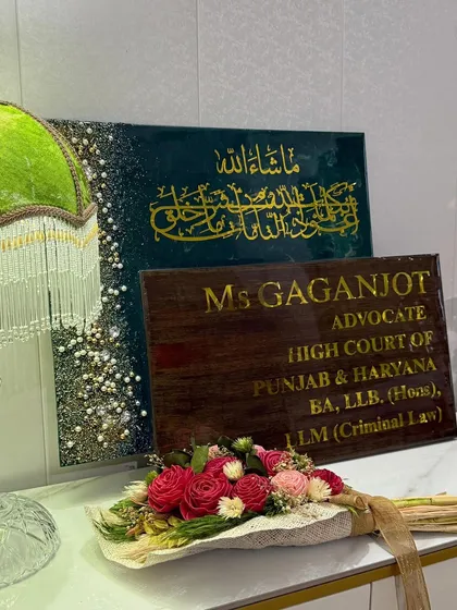 Resin art isn't just for homes. I created this set of professional plaques for an advocate's office, including a custom nameplate and a spiritual piece with a dua, adding a touch of personalized elegance to a workspace.