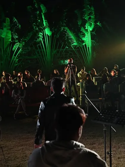 A view from the stage, looking out at the audience. Performing for a crowd under the open sky, surrounded by nature, is a truly special experience. This is what a live outdoor concert feels like.