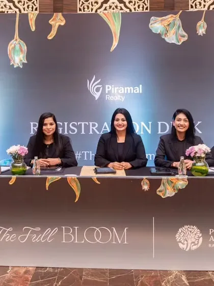 The first touchpoint for any guest is the registration desk. For Piramal, I designed a wide, well-lit desk with clear branding that was both functional for check-in and visually aligned with the event's premium aesthetic.