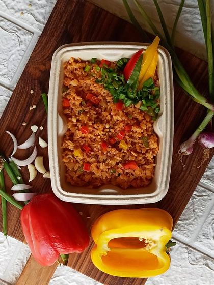 For those who like a bit of spice, my Schezwan Fried Rice is a great choice. It's tossed with colorful bell peppers, garlic, ginger, and a zesty Schezwan sauce.