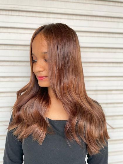 Another view of the Peanut Brown hair color, showing its natural allure and dimension. This shade is perfect for anyone wanting a sophisticated yet effortless style.