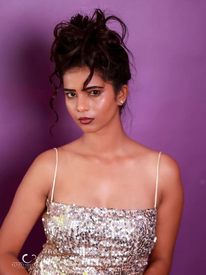 Another strong portrait in the sequin dress, this time with a more direct and challenging gaze.