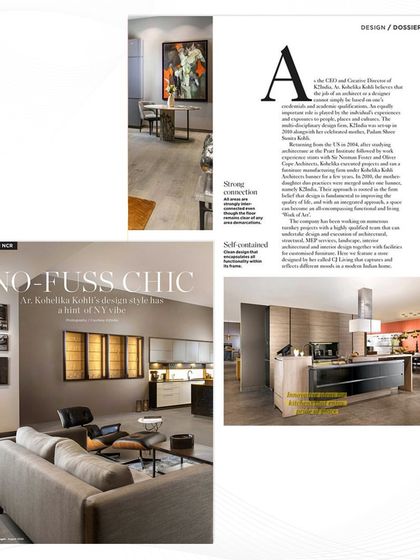 A magazine feature showcasing one of our kitchen designs. This 'no-fuss chic' kitchen combines sleek, handle-less cabinetry with warm wood tones and a comfortable seating area, reflecting a modern, functional, and inviting New York vibe.