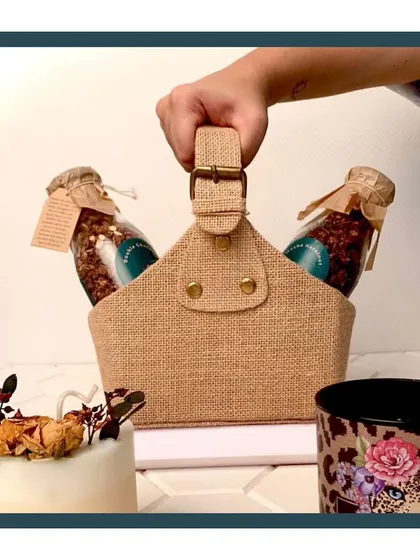 A closer look at my healthy granola hamper. The jute basket carrier makes it a stylish and convenient gift for anyone who appreciates wholesome, delicious treats.