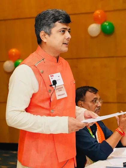 Sharing my knowledge is a core part of my practice. Here, I am addressing fellow entrepreneurs at a BNI meeting, explaining how the principles of Vastu and astrology are not just for homes, but are powerful tools for business growth and creating a positive corporate environment.