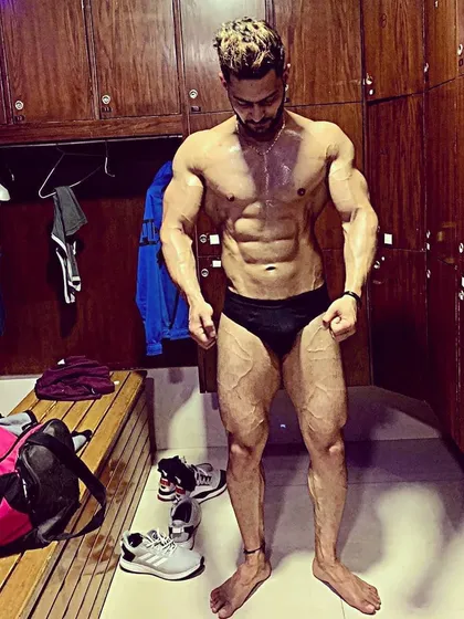 Post-workout in the locker room. This is where you see the pump and the immediate results of a great training session. The work never stops.
