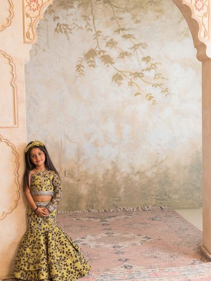 A full view showcasing the unique print and silhouette of this designer lehenga.