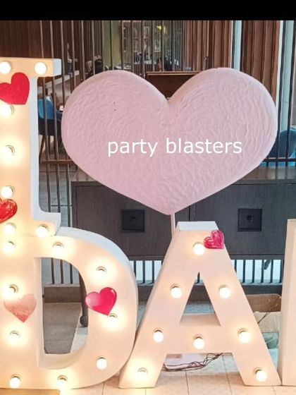 Another angle of the "I ❤️ DAD" marquee sign, showing its scale and impact.