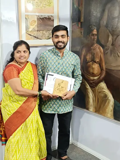 With my mother next to my award-winning painting "Contrast of life." Her support means everything.
