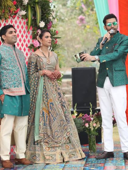 Engaging with the couple on stage, making sure their story is the highlight of the evening.