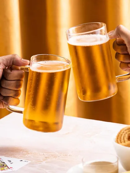 Capturing action and connection. This shot for Borosil's beer mugs isn't just about the product; it's about the moment of "cheers" between friends, creating a relatable and aspirational lifestyle image.