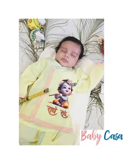 A precious moment with a newborn dressed as little Krishna. Our outfits are made from the softest fabrics to ensure your baby is comfortable during his first festival.