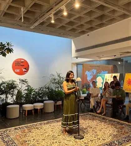 Our founder, Saumya Choudhury, emceeing an open mic at the Alliance Française de Delhi. We believe in creating a welcoming space that encourages both new and experienced poets to take the stage.