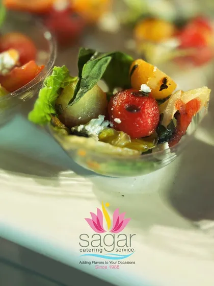 This refreshing watermelon and feta salad is served in individual cups for easy enjoyment. The combination of sweet watermelon, salty feta, and fresh mint is perfect for warm-weather events.