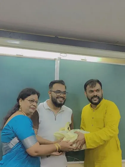 "Let's spark success and shine together." A teacher receives a gift during our staff Diwali celebration, recognizing the hard work of our dedicated team.