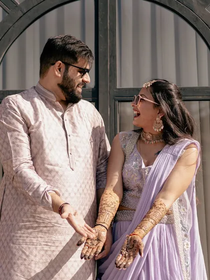 Pure, uninhibited laughter between the couple. These are the candid moments that truly define your love story.