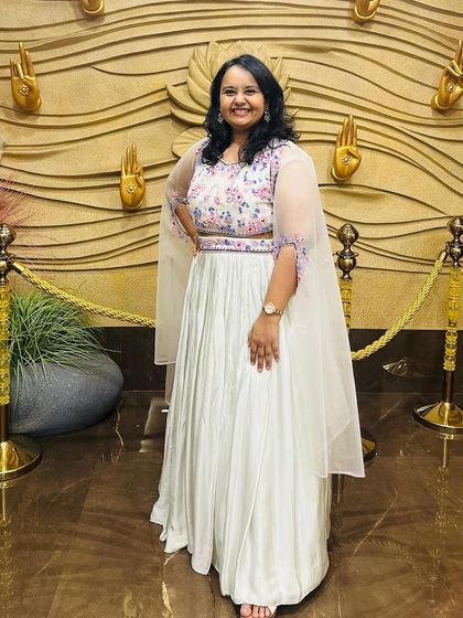 A full-length view of the mint green Indo-western lehenga, showing how the shrug completes the modern, elegant look.