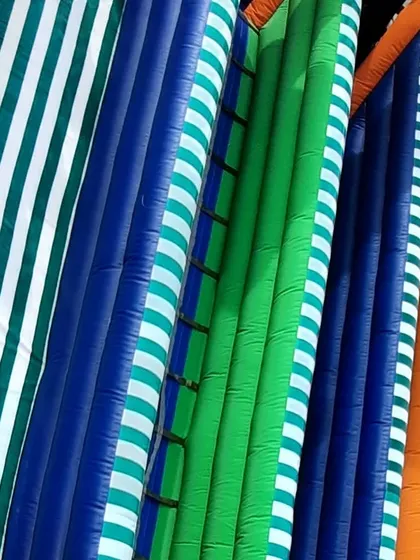 A close-up look at the climbing and sliding lanes. I use strong, reinforced vinyl with vibrant, lasting colors to ensure the inflatable looks great and holds up to constant use.