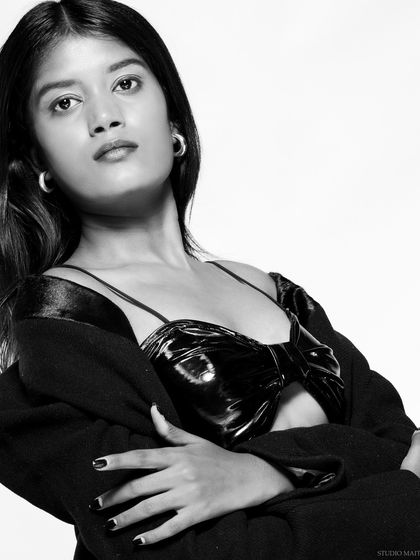 A black and white version of a close-up portrait, adding a classic and timeless feel.