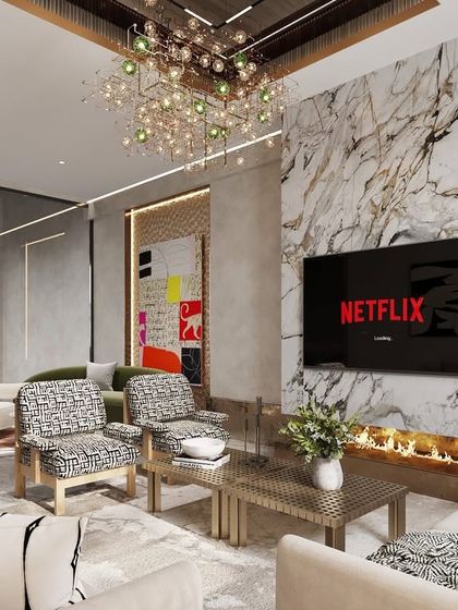 This living room is a study in contrasts, pairing a dramatic bookmatched marble fireplace with soft, comfortable seating and a playful chandelier. It's a space that feels both luxurious and ready for a cozy night in.