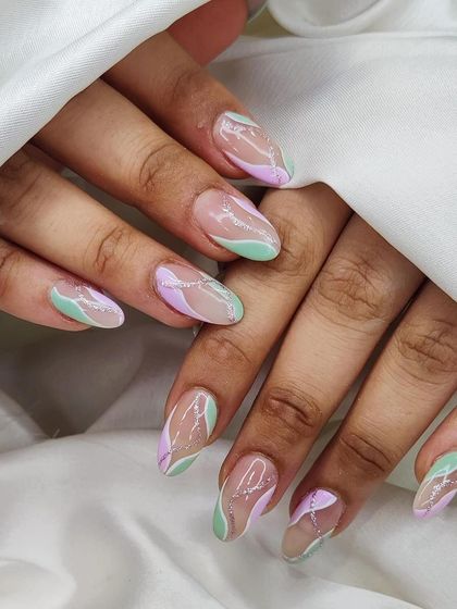Another look at the pastel swirl design, showing the delicate lines and glitter details against a sheer background.
