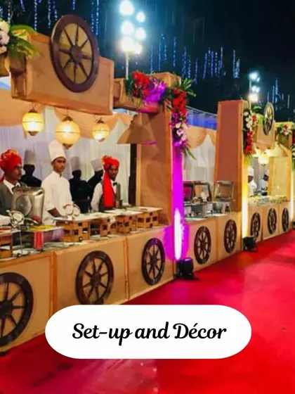 For large gatherings, I create a grand "shaadi waala feel". This image shows a fully themed buffet setup with decorative carts and professional staff, designed to handle big crowds while making the event feel special and organized.