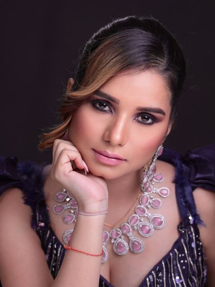 Another angle of the reception look, showing the side-swept hairstyle.