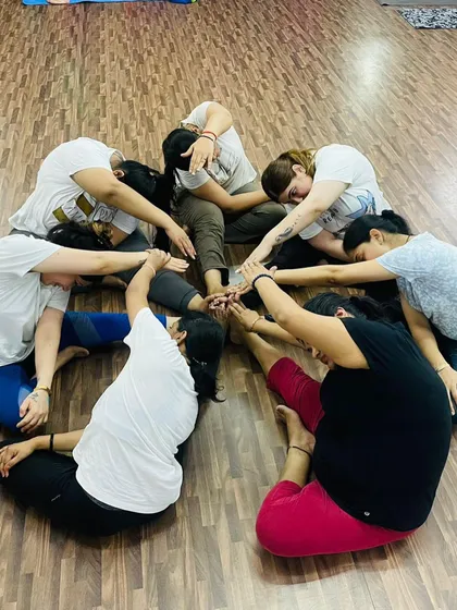 We grow stronger together. This group circle stretch is a perfect example of how we use partner work to deepen our practice, improve flexibility, and build a strong sense of community in the studio.