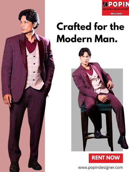 A classic pinstripe suit in a rich magenta color. This three-piece set offers a modern take on a timeless pattern, crafted for the man who appreciates sharp dressing.