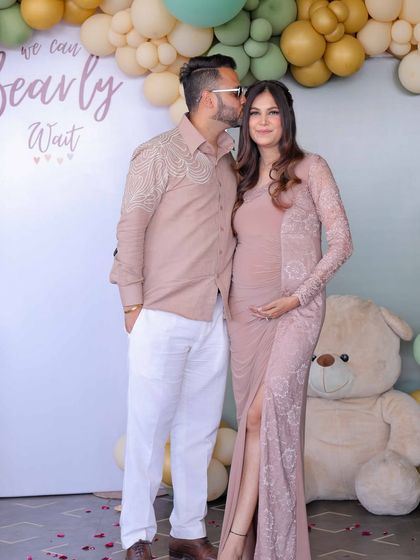 A sweet moment captured between the parents-to-be. My goal is to create beautiful backdrops that serve as the perfect setting for these cherished memories.