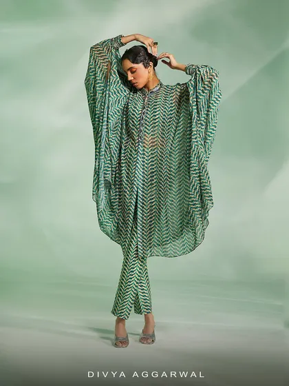 The Riley set in a green chevron print, with a breezy silhouette and pintuck detailed pants that promise compliments.