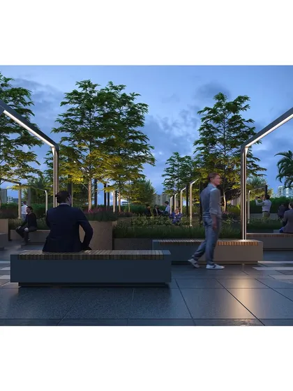 Modern lighting fixtures double as sculptural elements, framing seating areas and providing functional illumination for this rooftop terrace plaza.