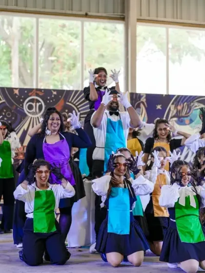 A fun and expressive group pose from the Open Style batch, capturing the playful and magical theme of their performance.