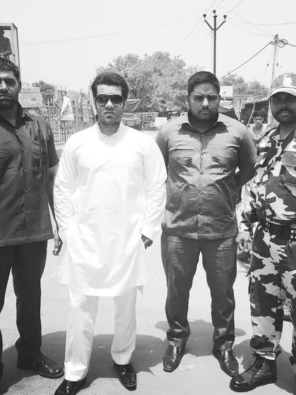 With my security team. This black and white shot captures the serious nature of providing top-tier criminal defense.