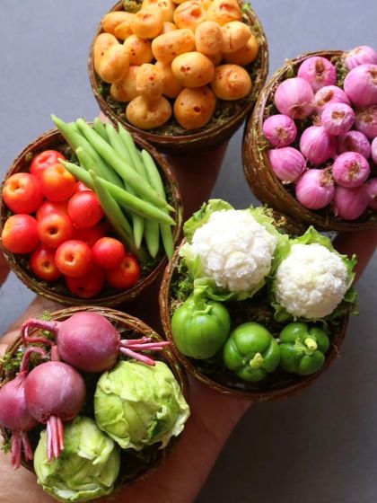 A handful of my miniature vegetable baskets, showing the vibrant colors and textures.
