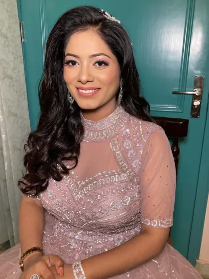 A soft engagement glam look for my bride Neha. The focus was on pink-toned eyeshadow and a natural, skin-like finish.