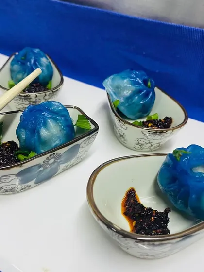 From our innovation series, these Blue Pea Prawn Dimsum are as stunning as they are delicious. The natural blue color comes from butterfly pea flowers, adding a touch of magic to the dish.