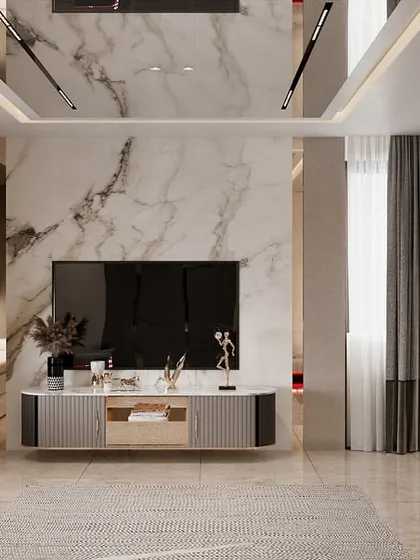 A bedroom TV and lounge area where we executed the installation of a marble feature wall and a mirrored ceiling. The bay window seating with built-in storage was also constructed by our team.