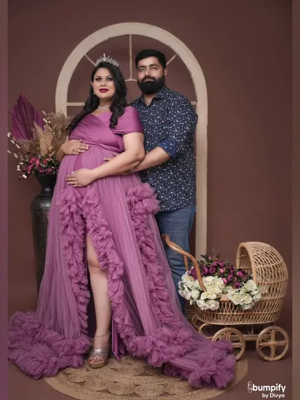 The complete setup with the couple, the arched window prop, and the baby pram. This shows how we can combine different elements to create a rich, story-filled photograph.