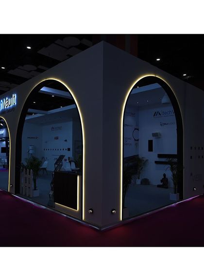 Our exhibition booth illuminated at night. The design, with its clean lines and modern lighting, was created to reflect our brand's commitment to sleek, sophisticated, and seamless technological integration.