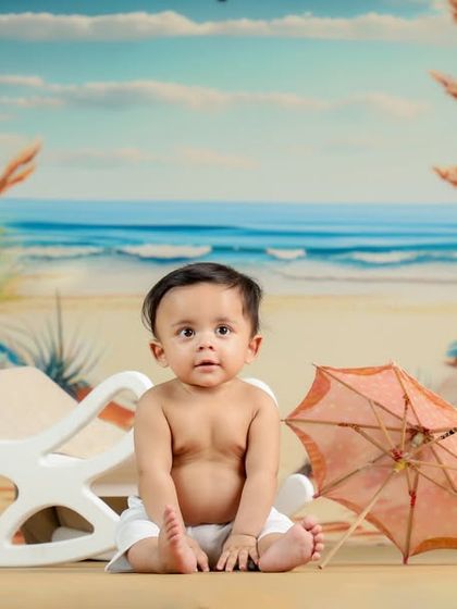 A beach baby enjoying the sun. This theme is so cute for little ones, making it look like they are on a tropical vacation.